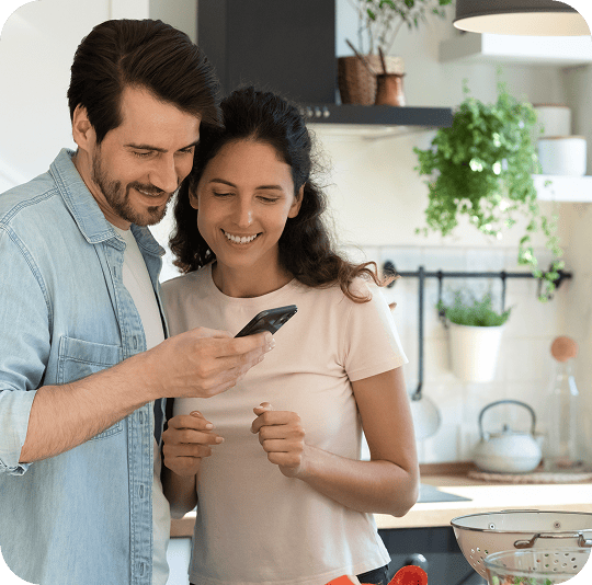couple calling a heating engineer in the wirral